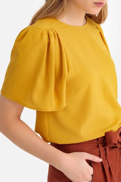 Top femme : 21 modèles dans notre shopping-liste
