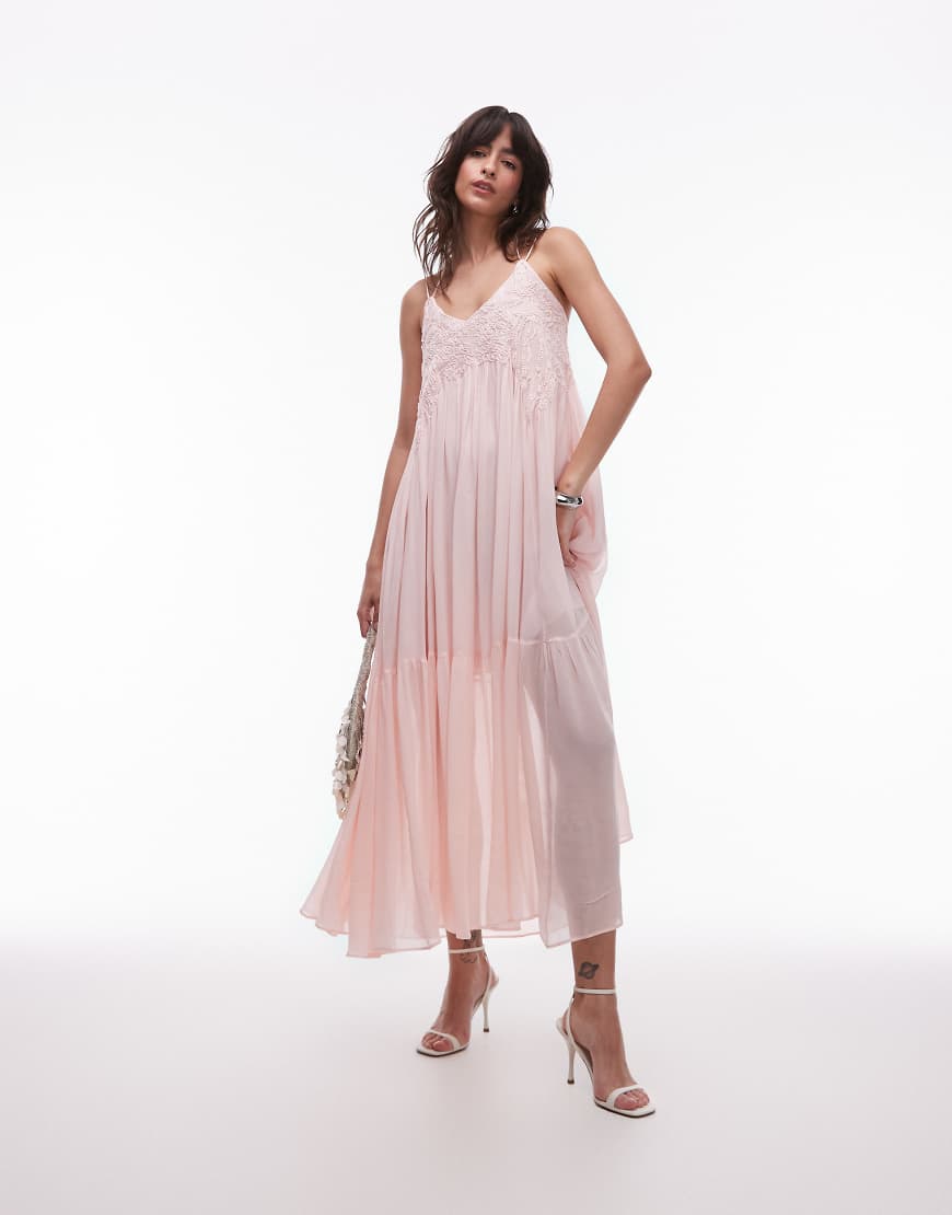 & Other Stories – Robe longue à taille basse et broderie à 217,99 € chez ASOS