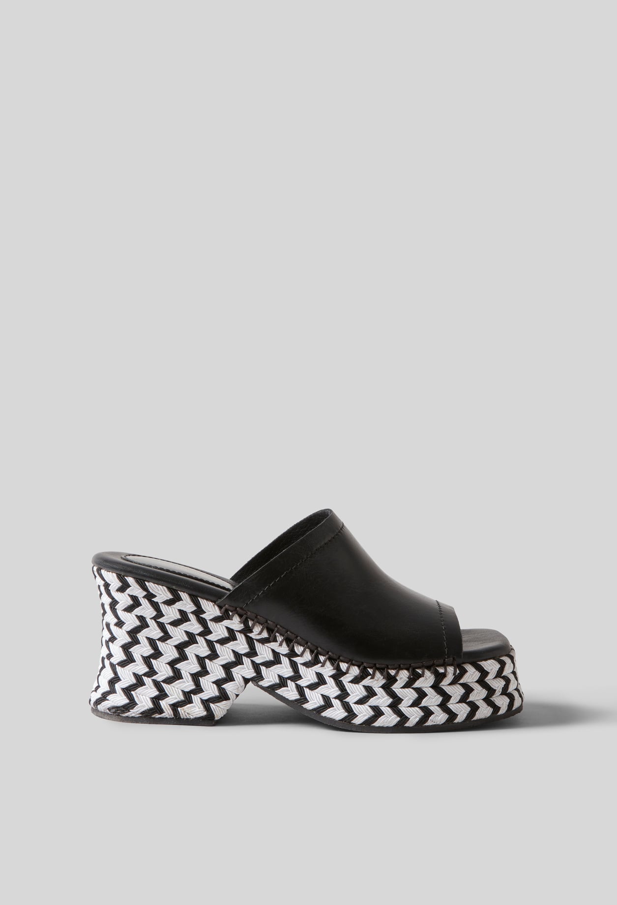 Mules tress&eacute;es bicolores